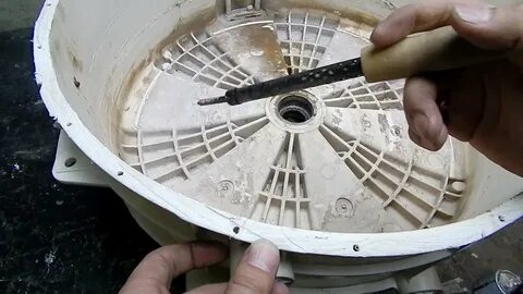 Пластиковый барабан в стиральной