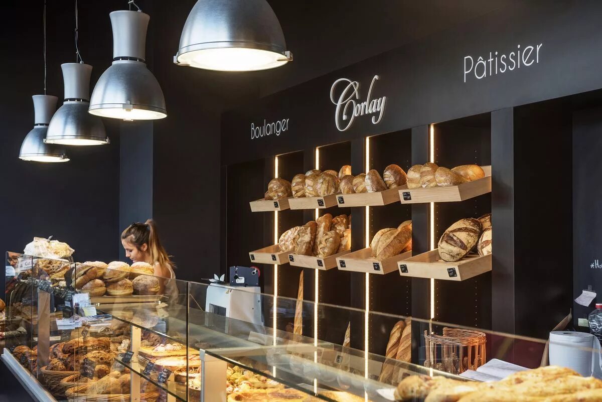 Выкладка хлеба. Мадам бриошь пекарня. Хлебное место пекарня. Американская пекарня. Пекарня кондитерская.