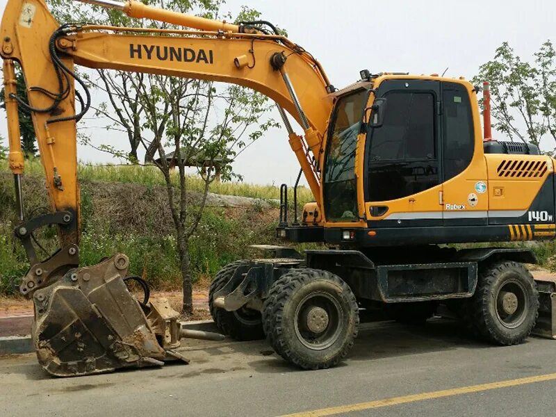 Хундай 180 экскаватор колесный. Hyundai r140w-9. Колесные экскаваторы хундай. Hyundai r140w-7. Экскаватор hyundai r140w-9s.