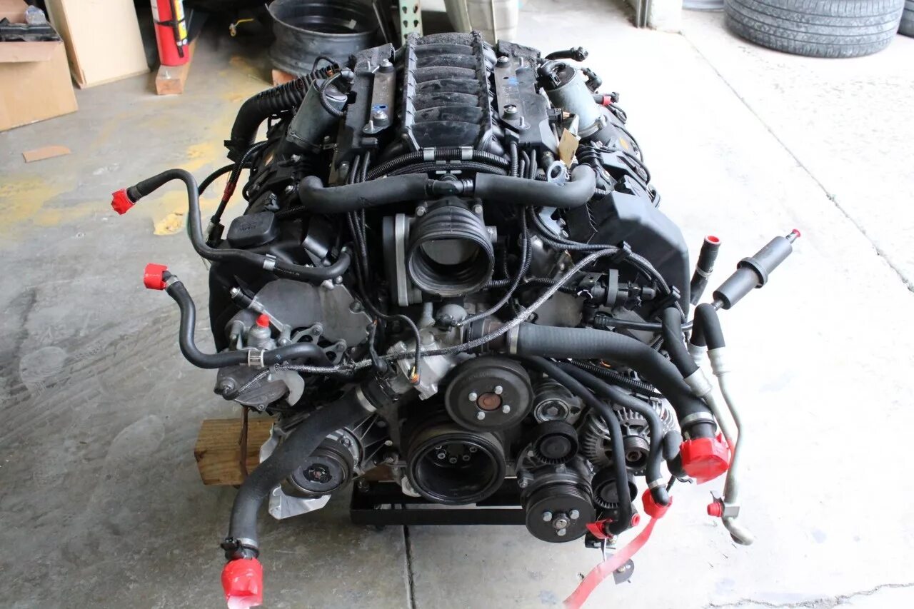 Двигатель бмв 750. 750li BMW мотор 4.8. BMW 750i 4.8. БМВ 750 fo2 4.4 двигатель. Двигатель BMW боксер 1150.