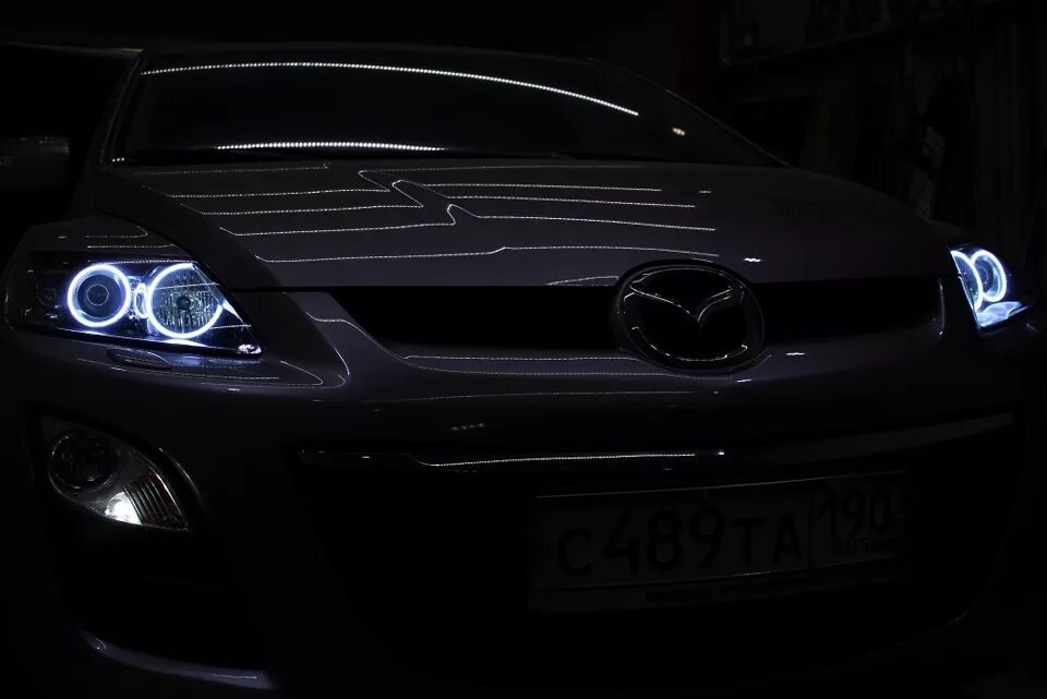 Тюнинг фар мазда. Ангельские глазки Мазда сх7. Mazda CX 7 ангельские глазки. Тюнинг фар Мазда CX 7. Tuning фар Mazda CX-7.