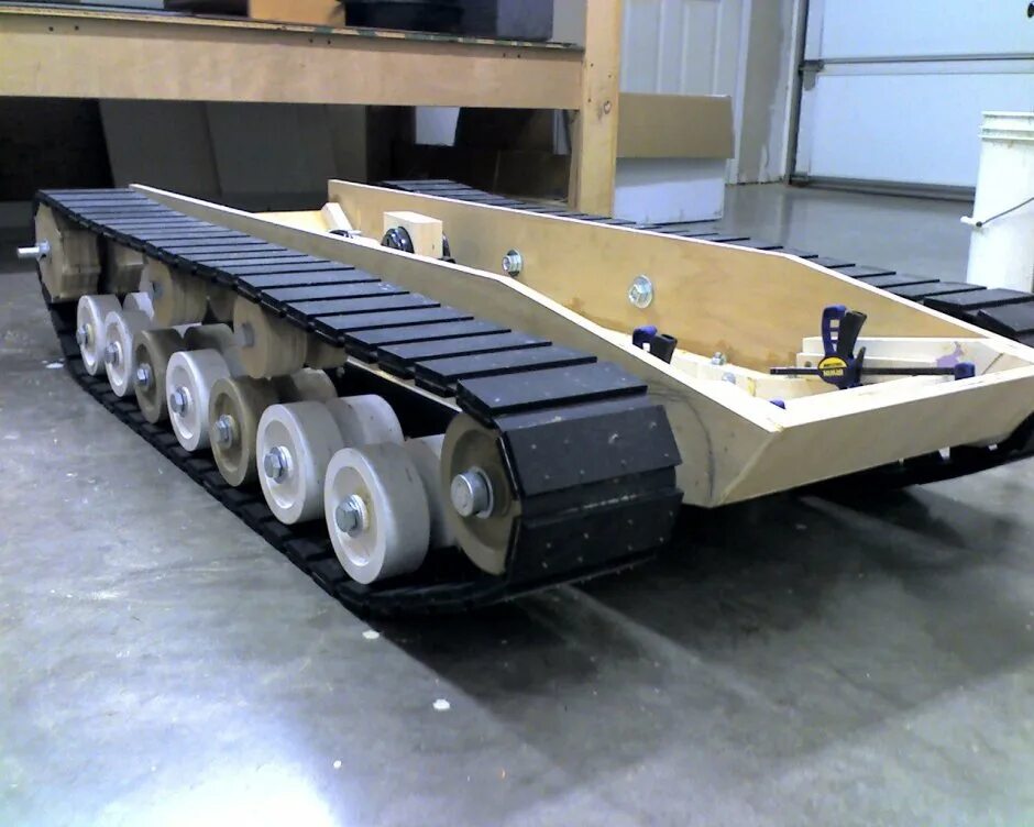 Шасси гусеница. Универсальное гусеничное шасси утс-140. самоходное гусеничное шасси шс-04. гусеничное шасси гм-5971. самоходное гусеничное шасси 830м.