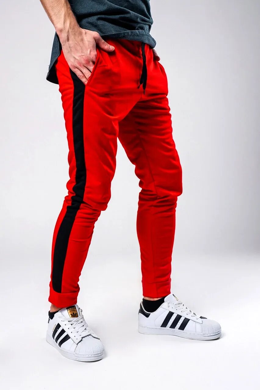 Брюки амстафф спортивные. Черно красные спортивные штаны. Штаны nike nsw hbr pant wvn stmt. Ecko unltd одежда мужская брюки. Спортивные штаны найк аир.