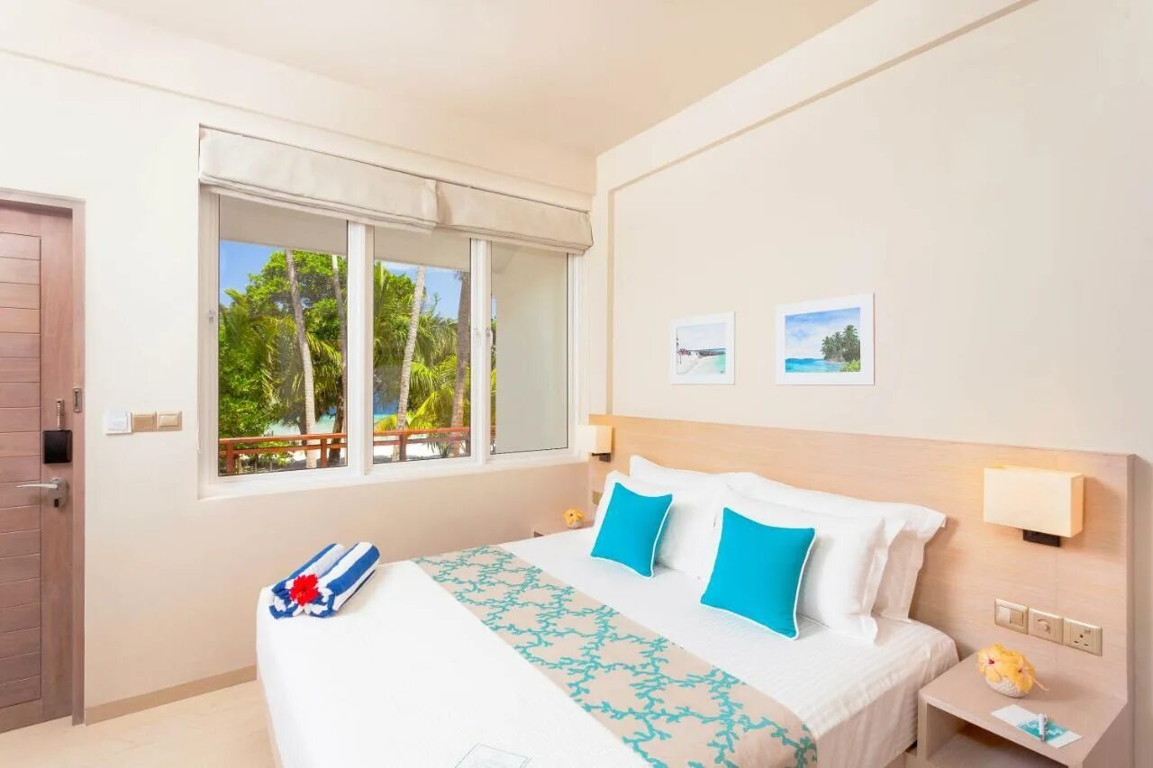 Malahini kuda bandos 4 мальдивы. Отель bandos maldives 4. Malahini kuda bandos resort 4 мальдивы. Отель malahini kuda bandos 4. Malahini kuda bandos 4 garden room.