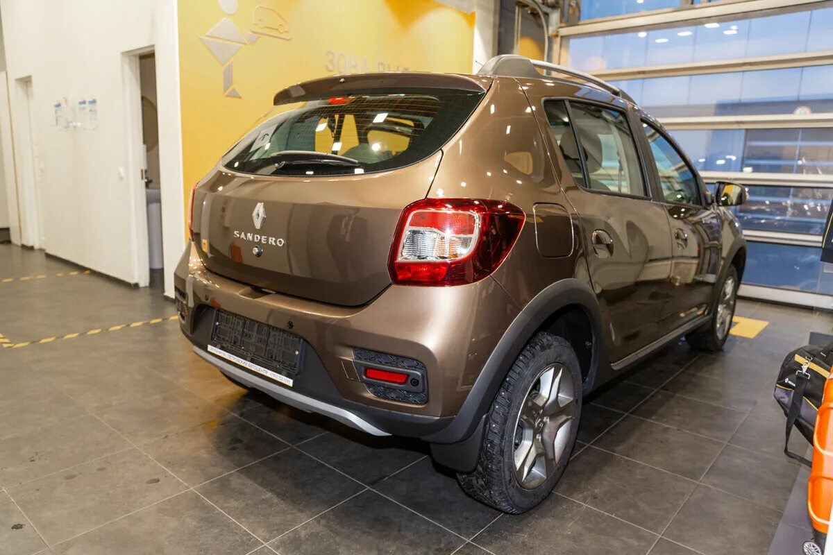 Renault sandero цвета. Renault Sandero Stepway коричневый. Рено Сандеро степвей коричневый 2021. Рено Сандеро степвей коричневый 2020. Рено Сандеро степвей коричневый.