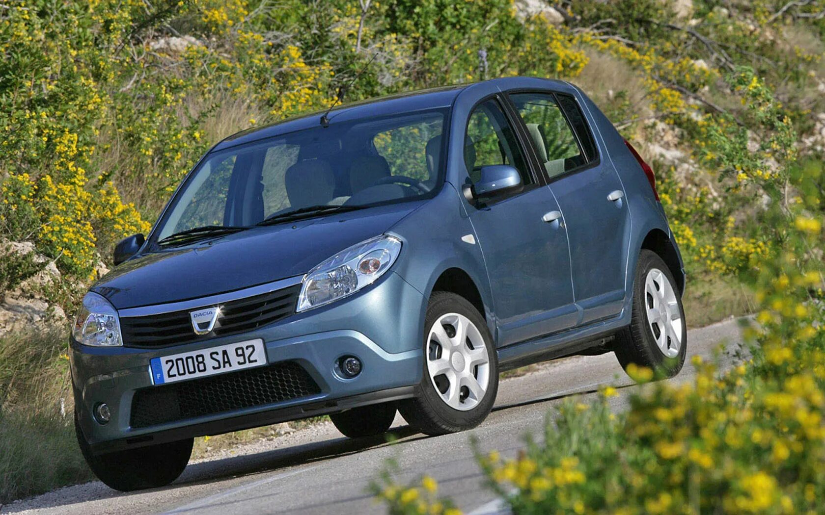 Рено Сандеро 2008. Renault Sandero 1.4. Рено Сандеро 2008 года. Дачия Сандеро 2010. Машина рено б у