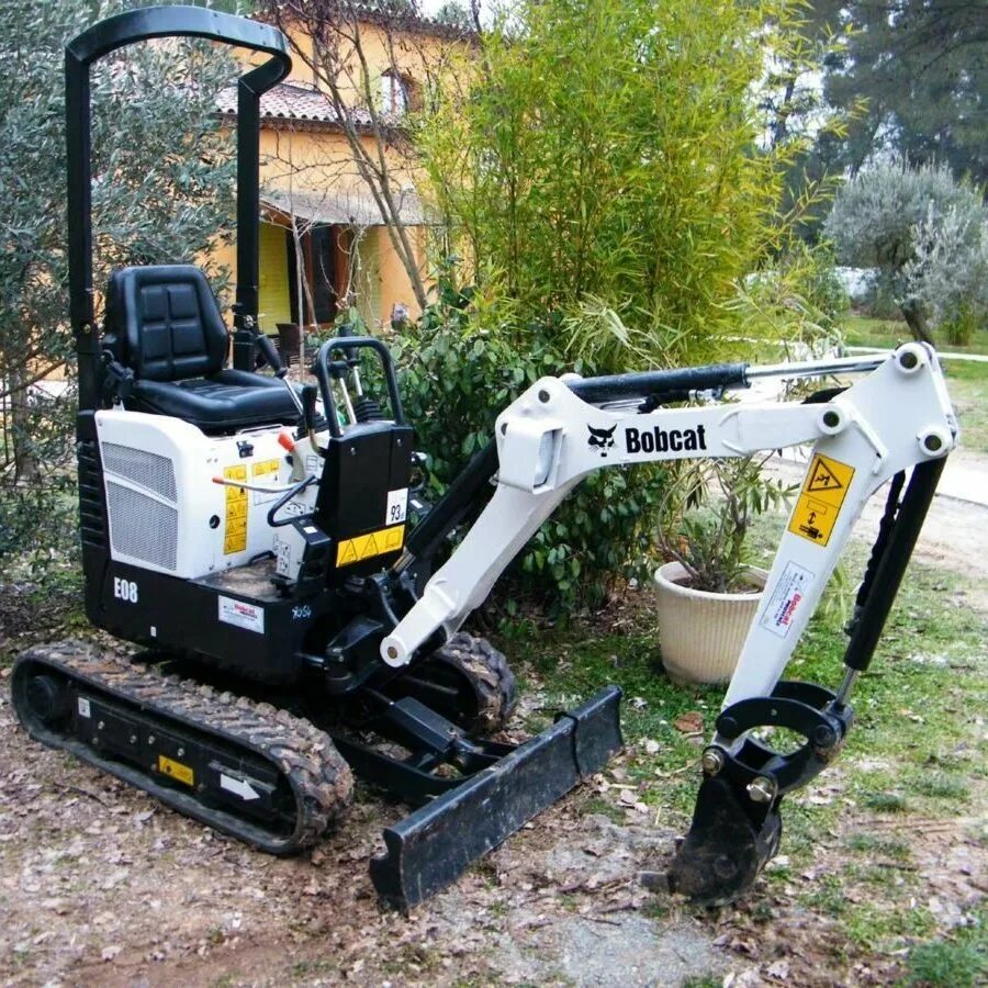 Bobcat e08. Миниэкскаватор Bobcat e19. Гусеничный мини-экскаватор Bobcat е08. Мини Бобкэт экскаватор гусеничный. Мини экскаватор bobcat