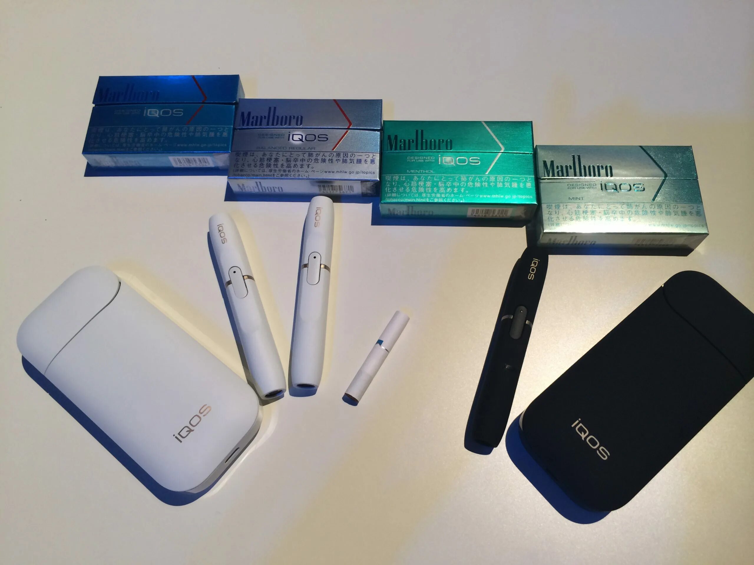 Айкос пачка. Айкос сигареты стики. IQOS a1505. Айкос МС Mate 1.2.