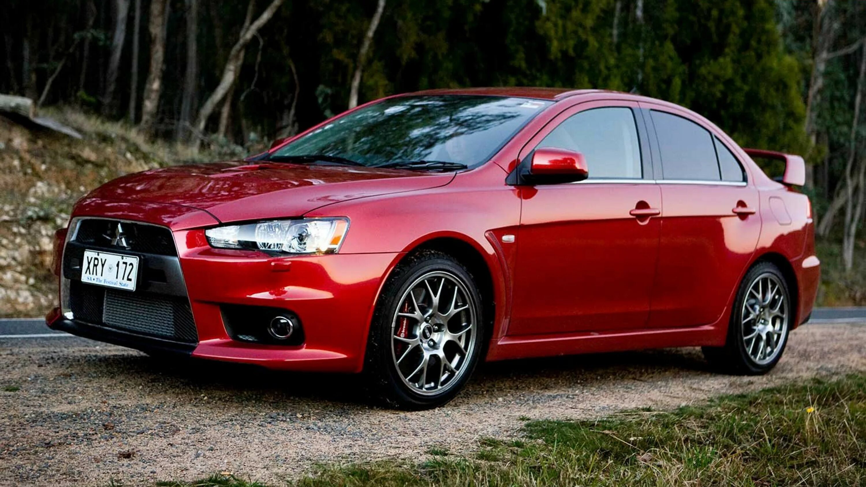 Mitsubishi lancer 10 поколения. Митсубиси Лансер 10. Mitsubishi Lancer Evolution x 2008. Lancer EVO 2008. 2008 Mitsubishi Lancer EVO X GSR.