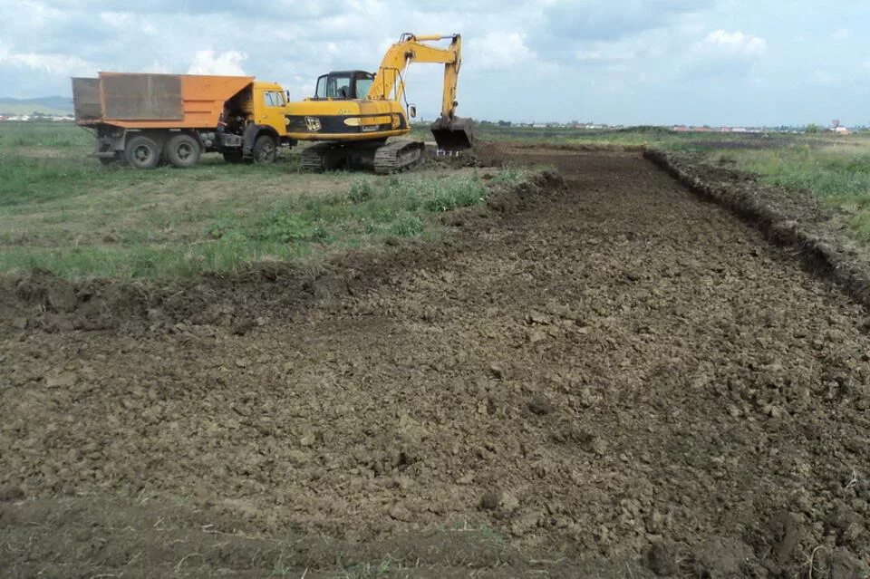 Снятие растительного слоя. Рекультивация плодородного слоя. Срезка плодородного слоя грунта. Рекультивация земель. Срезка растительного грунта.