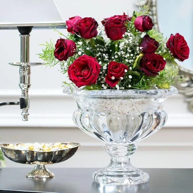 A Beautiful Bouquet of Flowers in a Green Vase