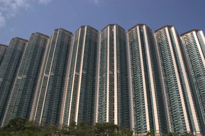 Самый большой жк. Стоэтажный дом в Китае. Гуанчжоу человейник. Человейники Гонконга 50 этажей. Пхеньян высотки.