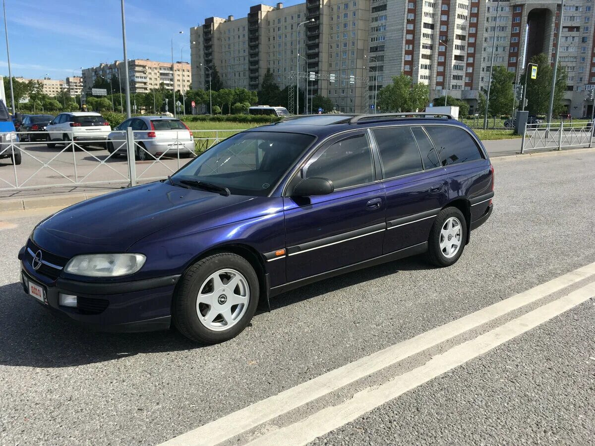 Опель омега б 2.2 бензин. Опель Омега б универсал 1997. Opel Omega 2.0 MT,. Опель Омега б 2.5 синий. Opel Omega b в синем цвете.