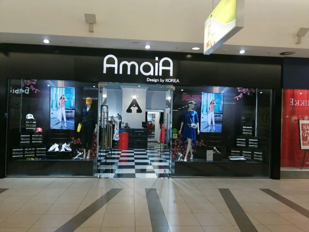 Золотая миля магазины одежды. Магазины одежды в трц акварель волгоград. Тц дарья модис клин. Спортмастер на московском. Ойшо в атриуме.