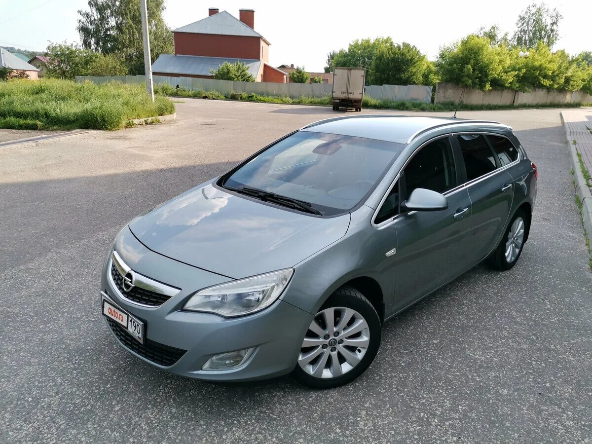 В дмитрове купить бу. Opel Astra j 2011. Opel Astra j 1.6 2011. Opel Astra j 2011 универсал.