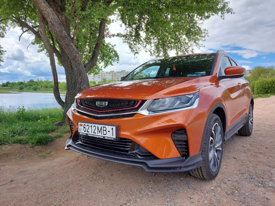 Geely coolray отзывы владельцев недостатки и достоинства. Geely coolray оранжевый. geely coolray 1.5. geely coolray 2025. джилли кулрей оранжевый.
