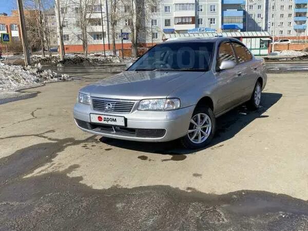 Ниссан санни иркутск. Nissan Sunny 2002 серебристый.