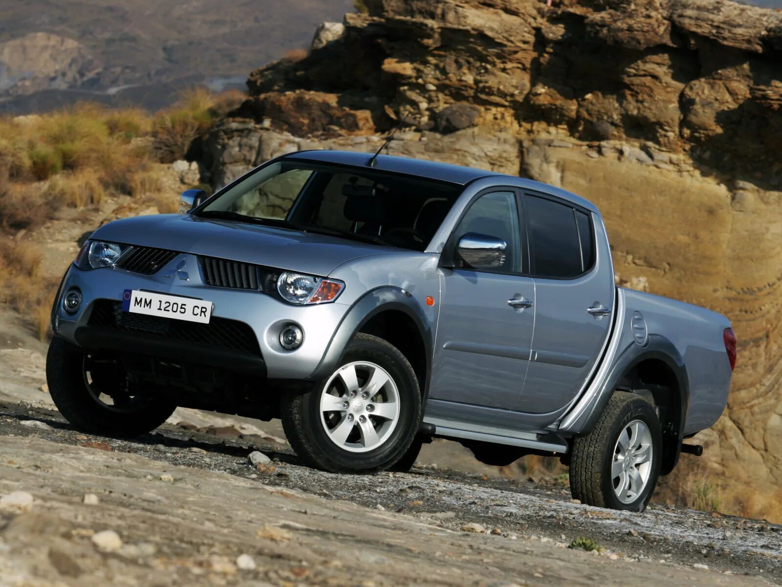 Мицубиси производитель. Митсубиси л200. Mitsubishi l200 4. Mitsubishi l200 2022. Митсубиси l200 2023.