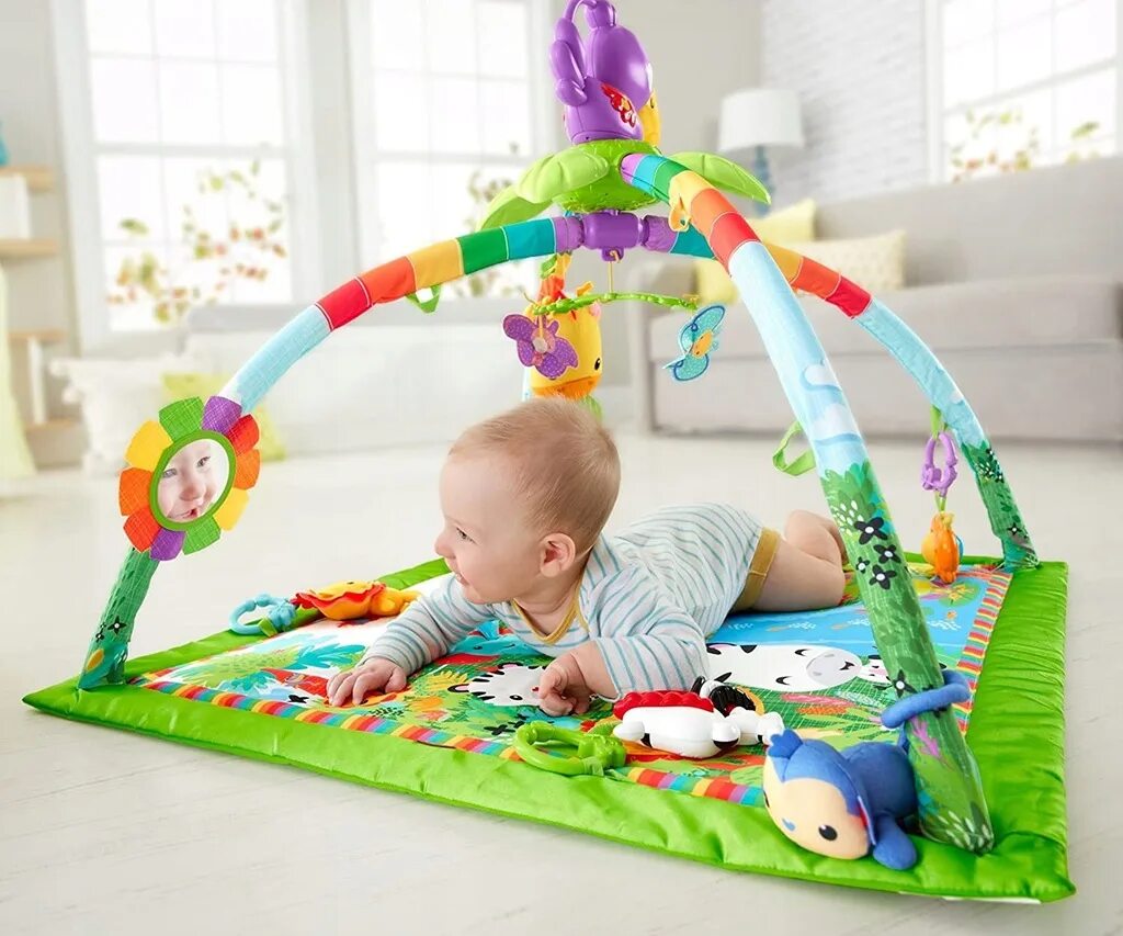Какой развивающий коврик лучший. Коврик fisher price тропический. развивающий коврик fisher-price тропический лес. fisher price rainforest коврик развивающий. коврик развивающий fisher price делюкс гимнастика fxc37.