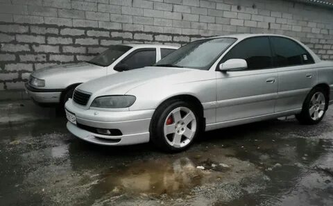 Омега 2000