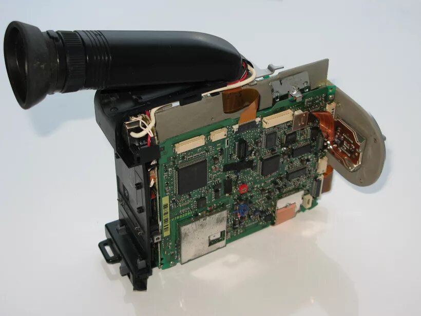 внутренности камеры видеонаблюдения. разобранный фотоаппарат. камера видеонаблюдения в разборе. камера vimicro vc0706. фотоаппарат в разборе.