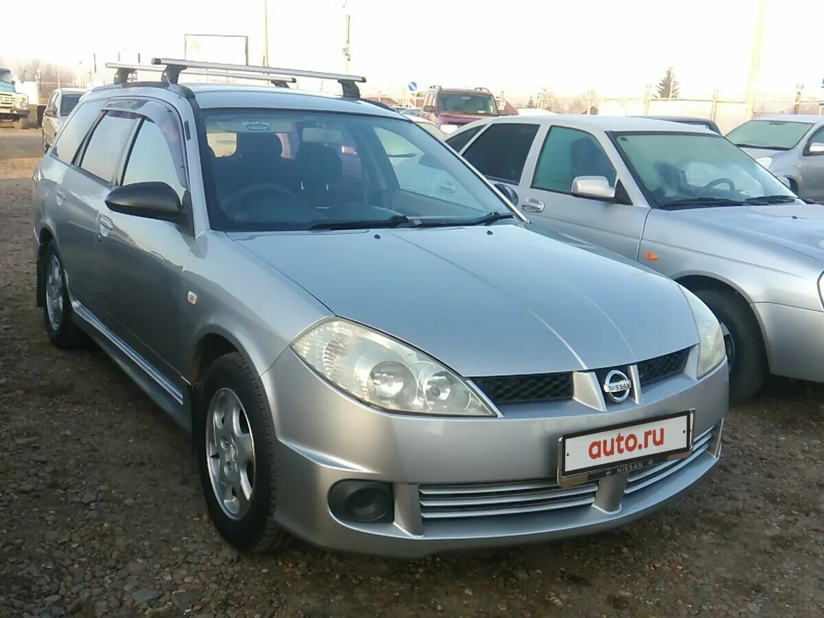 Купить б/у Nissan Wingroad II (Y11) Рестайлинг 1.8 AT (115 л.с.) 4WD бензин авто