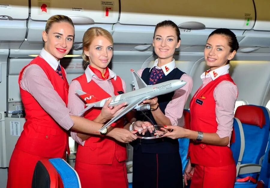 Норд винд экипаж. Авиакомпания nordwind стюардессы. nordwind airlines бортпроводники. nordwind airlines форма стюардесс. нордвинд авиакомпания с стюардесса.
