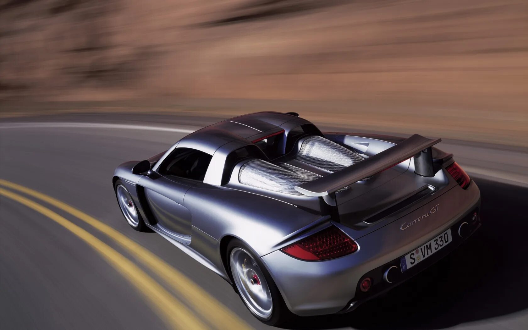 Сайт про автомобили. Порше Каррера ГТ. Porsche Carrera gt Rear. Шикарная машина. Плавные машины.