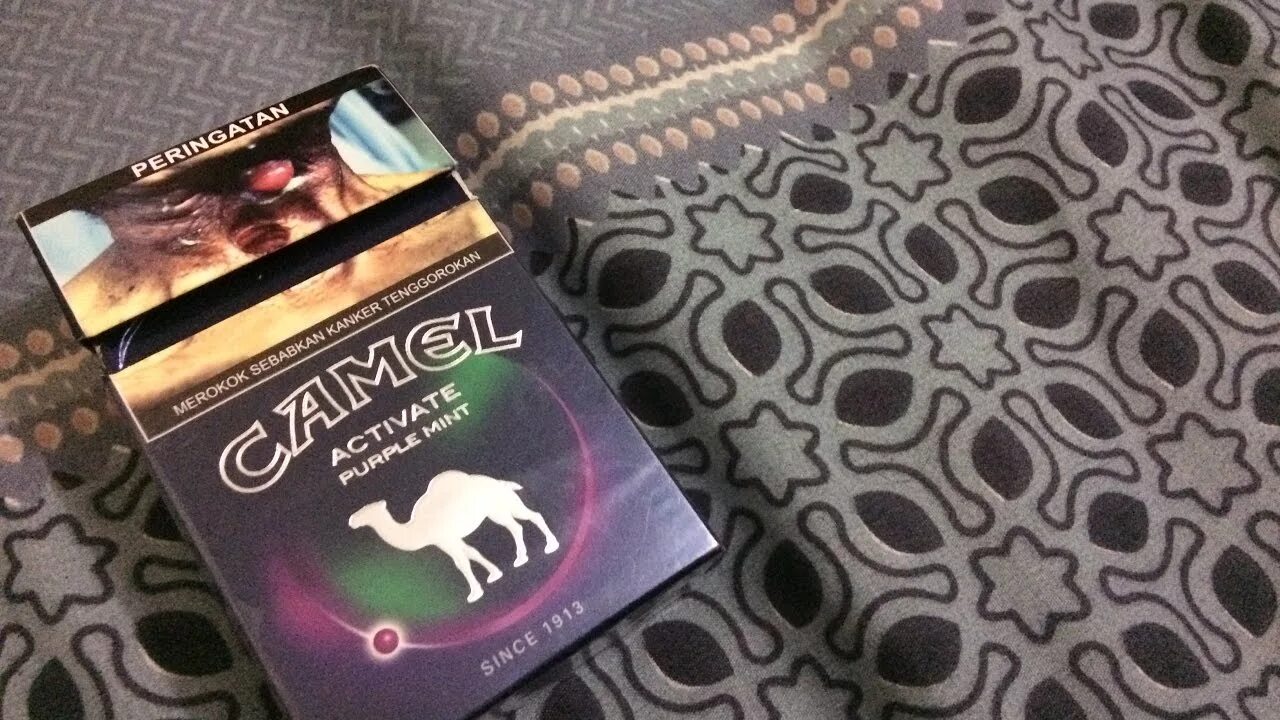 Кэмел с фиолетовой кнопкой. Camel Compact фиолетовый. Camel с фиолетовой капсулой. Camel Compact activate Purple. Вкус кэмел компакт