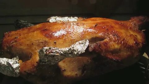 Гусь в духовке целиком с черносливом