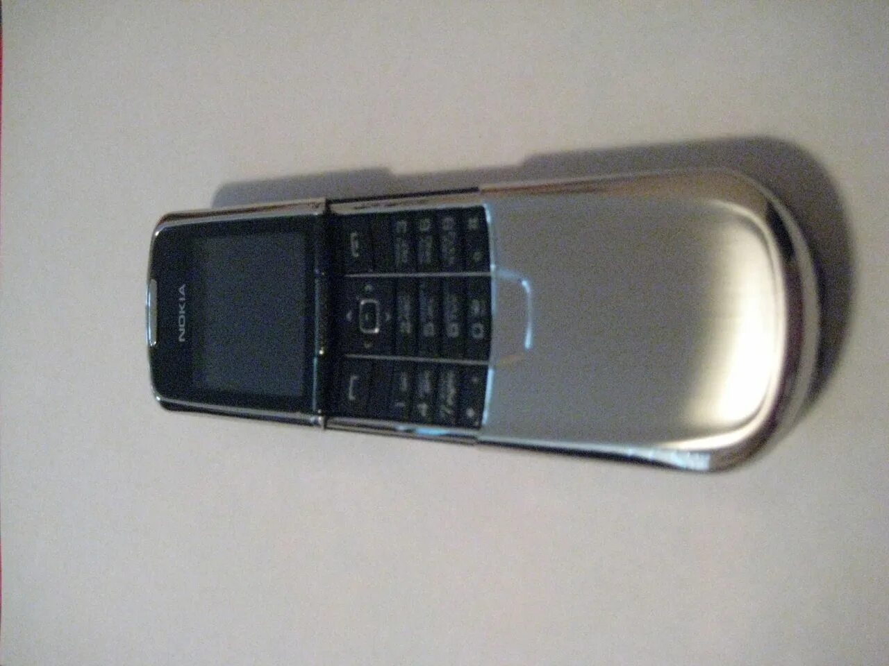 Нокиа Железный корпус 61. Nokia с железной крышкой спереди.