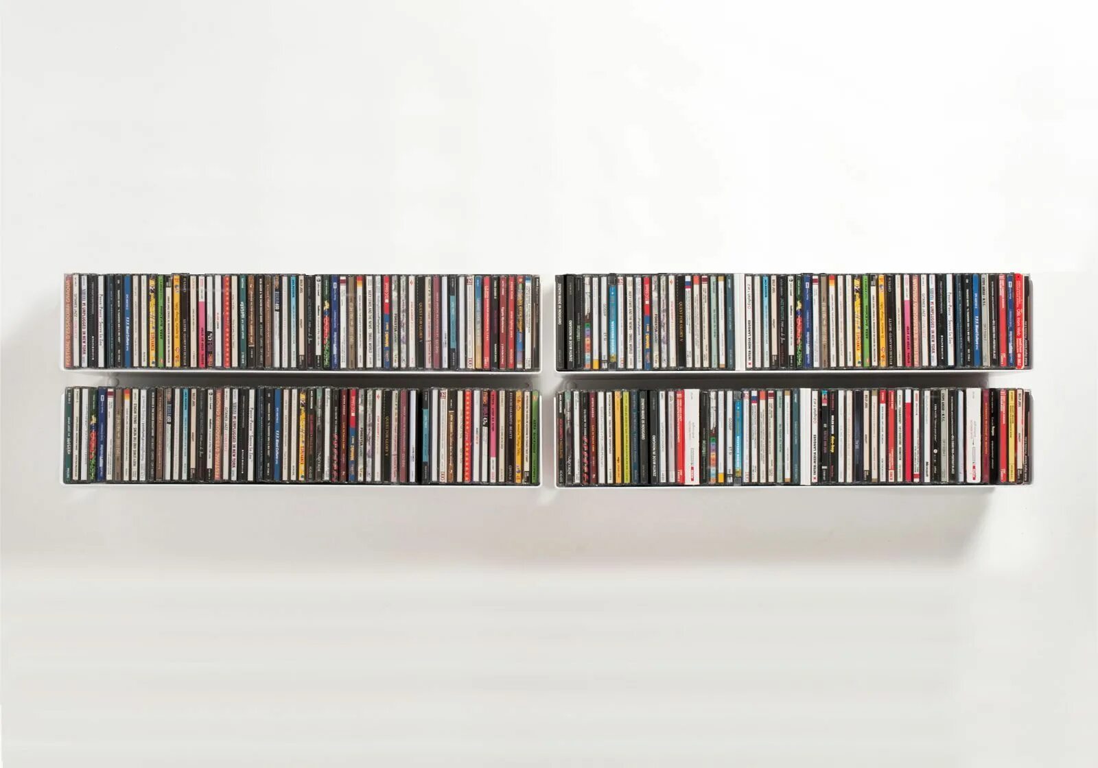 Подставка под cd диски. Полочка для дисков. стеллаж для сд дисков. полка для cd дисков. диски с полкой.