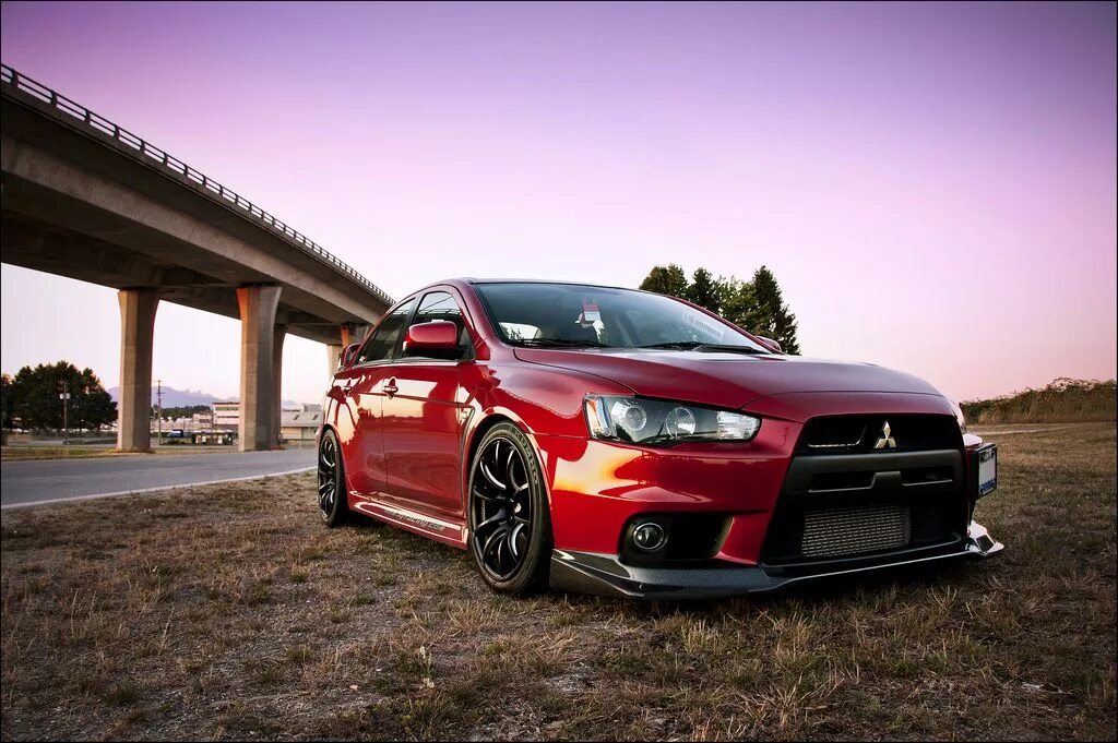 Mitsubishi evo x. Мицубиси Эволюшн 10. Лансер 10 Эволюшн. Lancer EVO 10. Митсубиши Лансер 10.