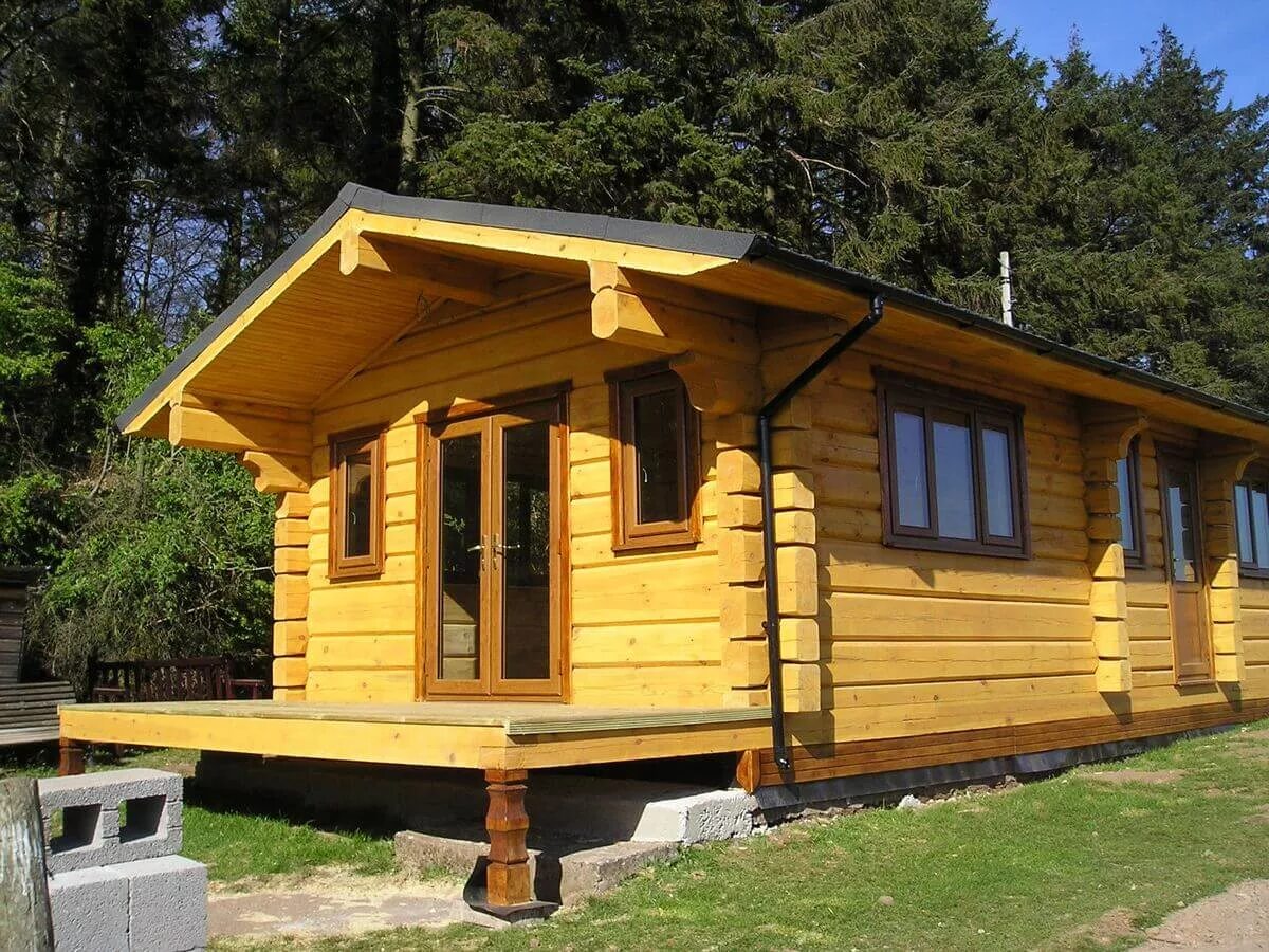 баня 3х6 из бревна с террасой. баня из лафета. летний дачный домик. бани под ключ для проживания. бани под ключ для проживания.