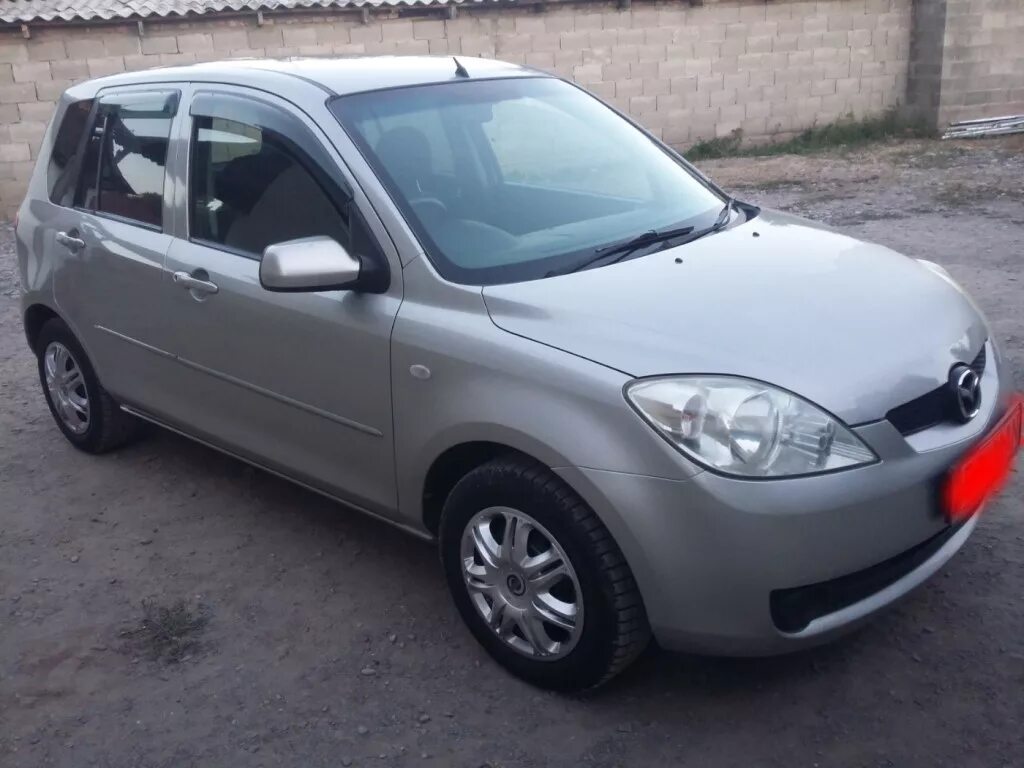 Купить мазду демио в новосибирске. Мазда Демио 2005г. Mazda Демио 2005. Mazda Demio 2005 год. Мазда Демио Рестайлинг 2005.