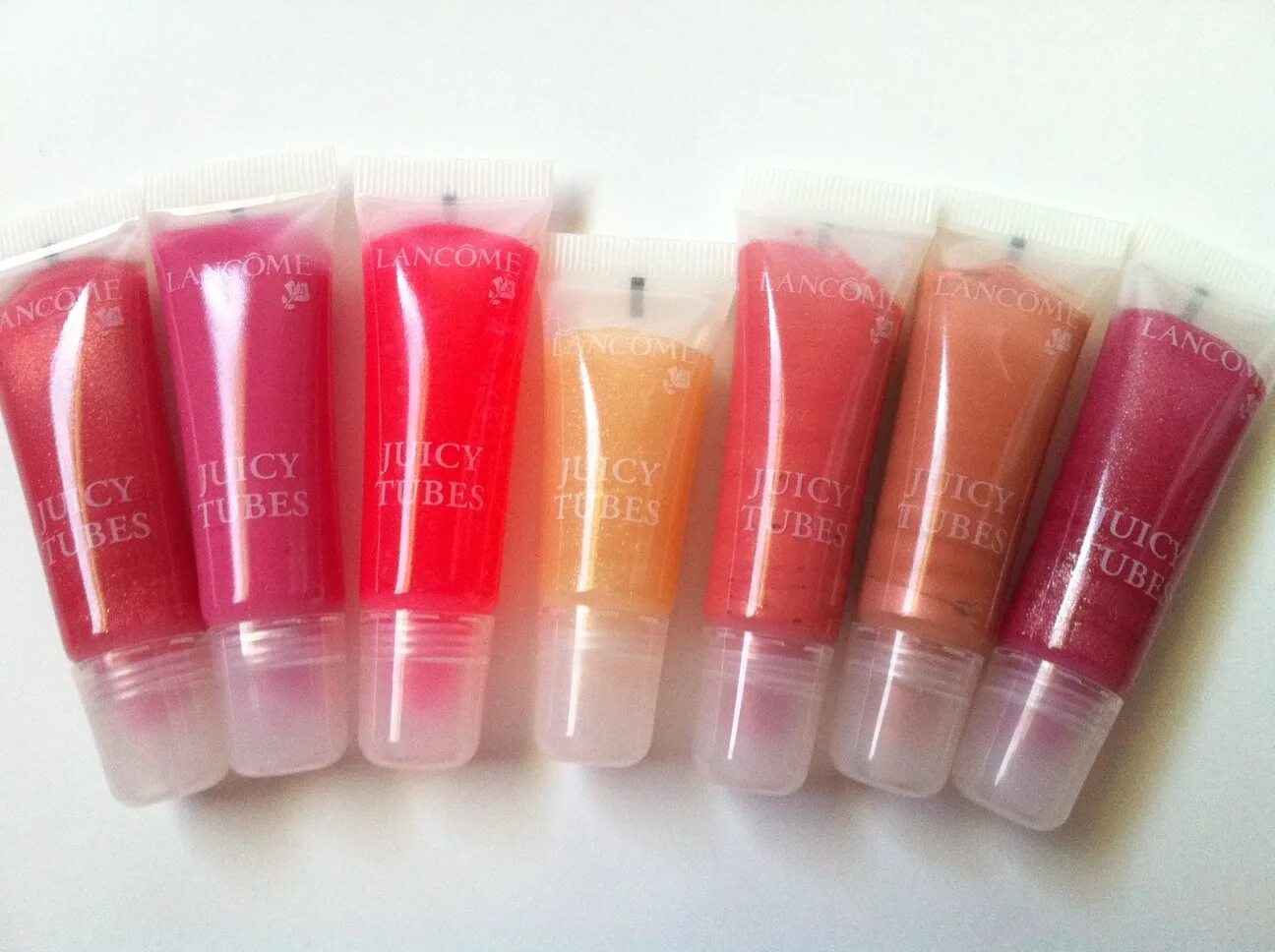 Juicy Lancome Lip Gloss. Блеск для губ в тюбике. Lancome блеск для губ в тюбике. Ланком пробник блеск для губ.