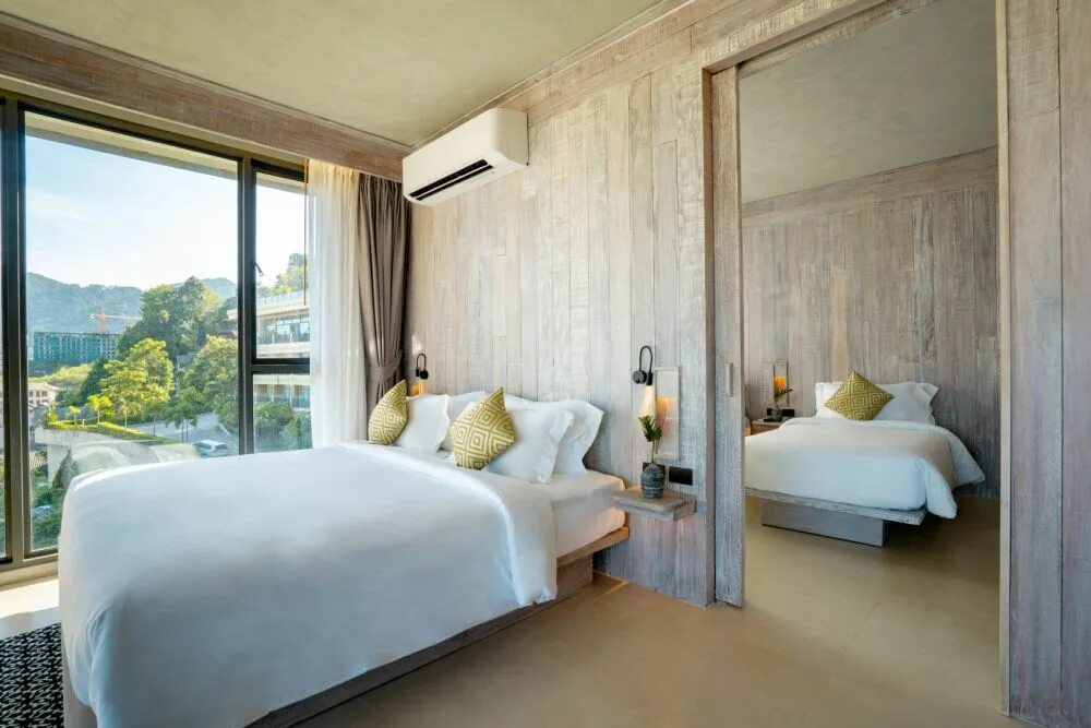 Vignette collection dinso resort. Dinso resort 4*. dinso resort phuket. dinso resort villas phuket. отель dinso пхукет четырехместный номер.