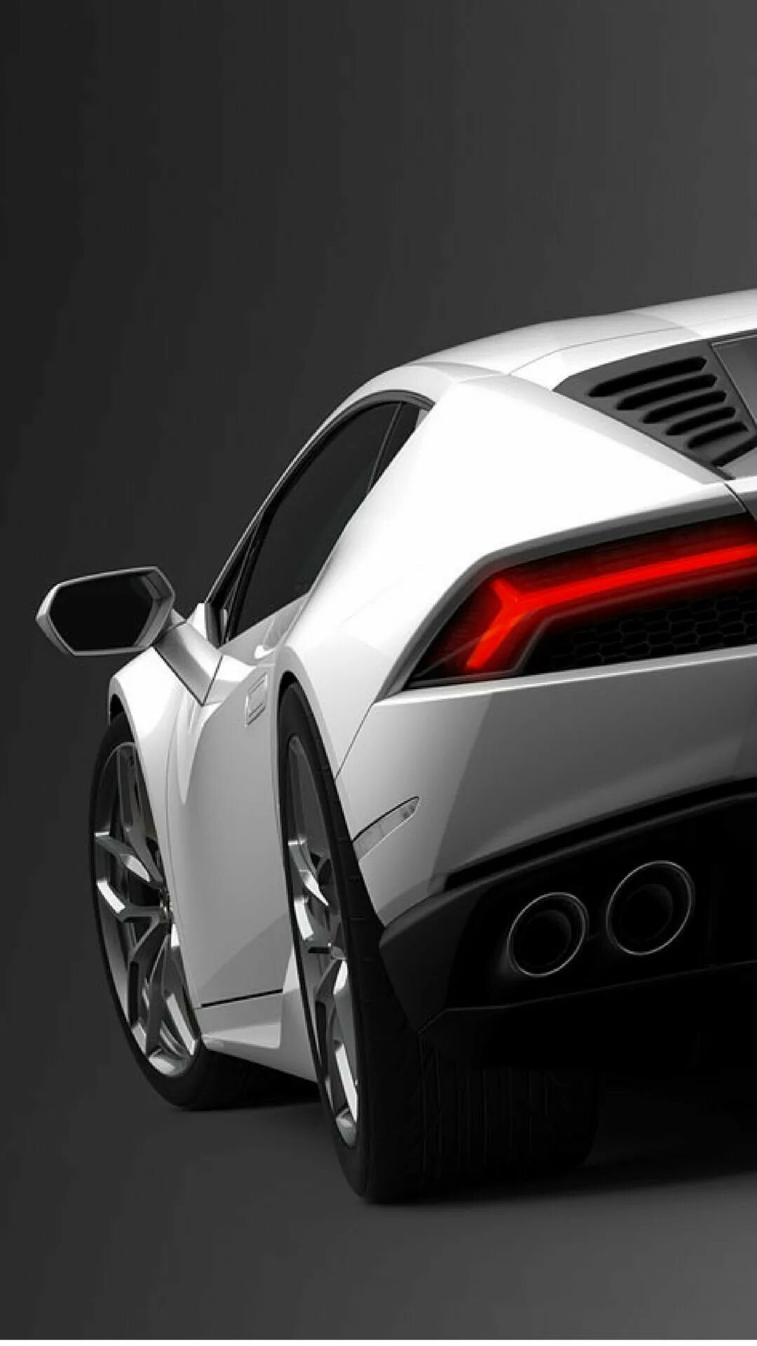 Телефон для автомобиля. Ламборджини на айфон. Lambo фары на r8. Обои машины вертикальные. Обои с машинами вертикально.