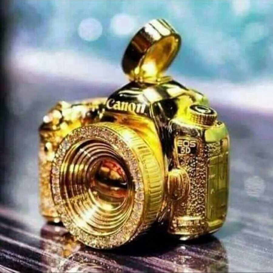 Самый дорогой камера. Самый дорогой фотоаппарат. Золотой фотоаппарат. Дорогой хороший фотоаппарат. Золотая видеокамера.