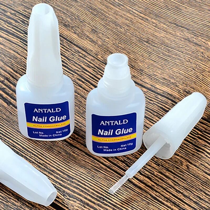 Как открыть клей для ногтей. Клей для ногтей Nail Glue. Клей для ногтей с кисточкой ANTALD 10 мл. Клей для типс с кисточкой. Накладные ногти с клеем.