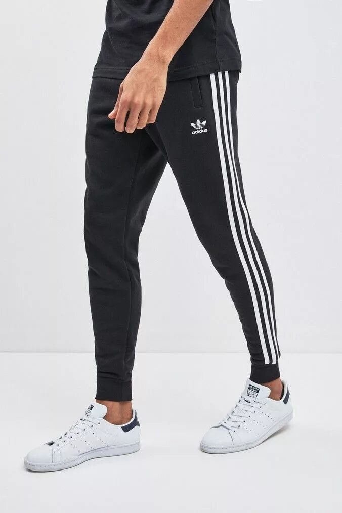 Брюки adidas must haves 3-stripes. Штаны адидас три полоски мужские. Спортивные штаны адидас с полосками. Адидас ессентиалс 3 полоски брюки. Адидас штаны мужские спортивные три полоски.