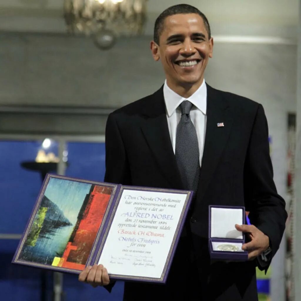 Барак Обама Нобелевская премия. Барак обанобелевская премия. Барак Обама лауреат Нобелевской премии. Барак Обама 2009.