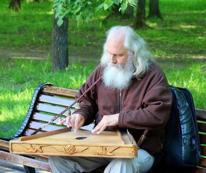 Музыкант гусли. Баян древнерусский певец-сказитель. музыкант играющий на гуслях. музыкант гусляр. сказитель с гуслями.