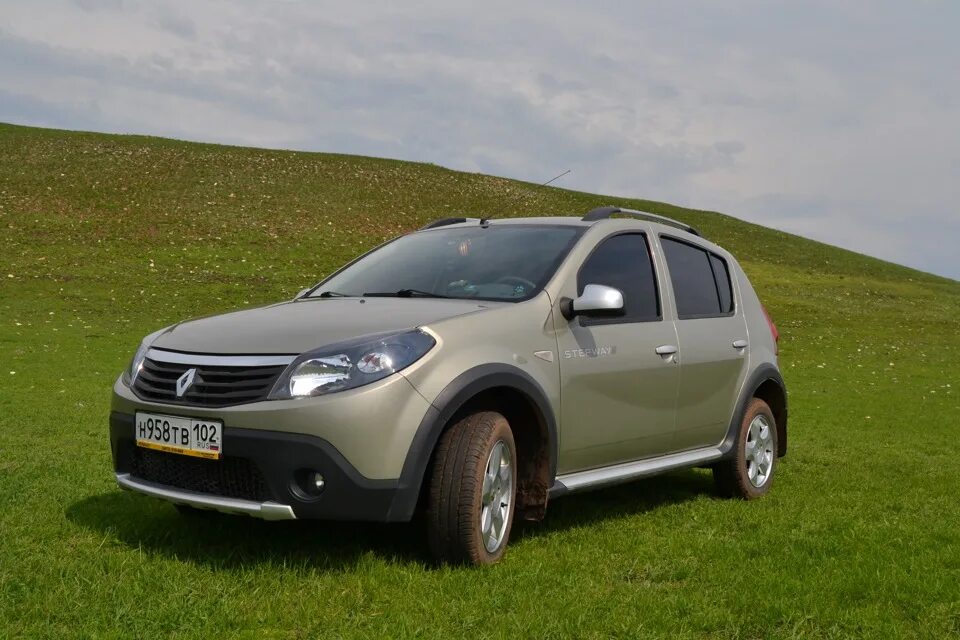 Renault sandero 2012. Renault Sandero 1. Рено Сандеро 2023. Рено Сандеро 1.6. Рено Сандеро 2005.