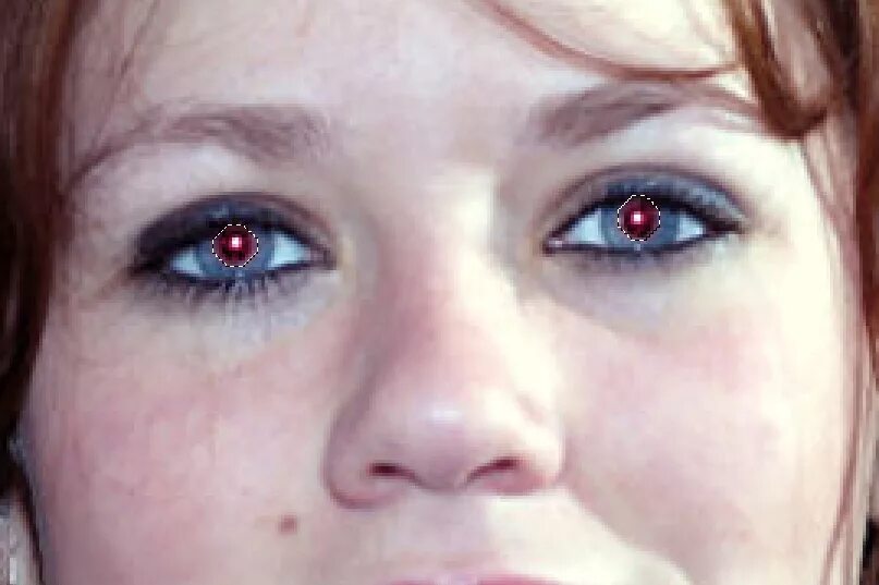 зрачки со вспышкой. светло карие глаза фото.