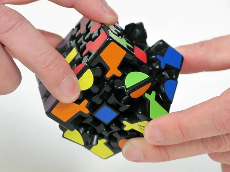 Шестеренчатый кубик Рубика. Meffert's David Gear Cube v2. Meffert's Maltese Gear Cube. Кубик Рубика с шестеренками.
