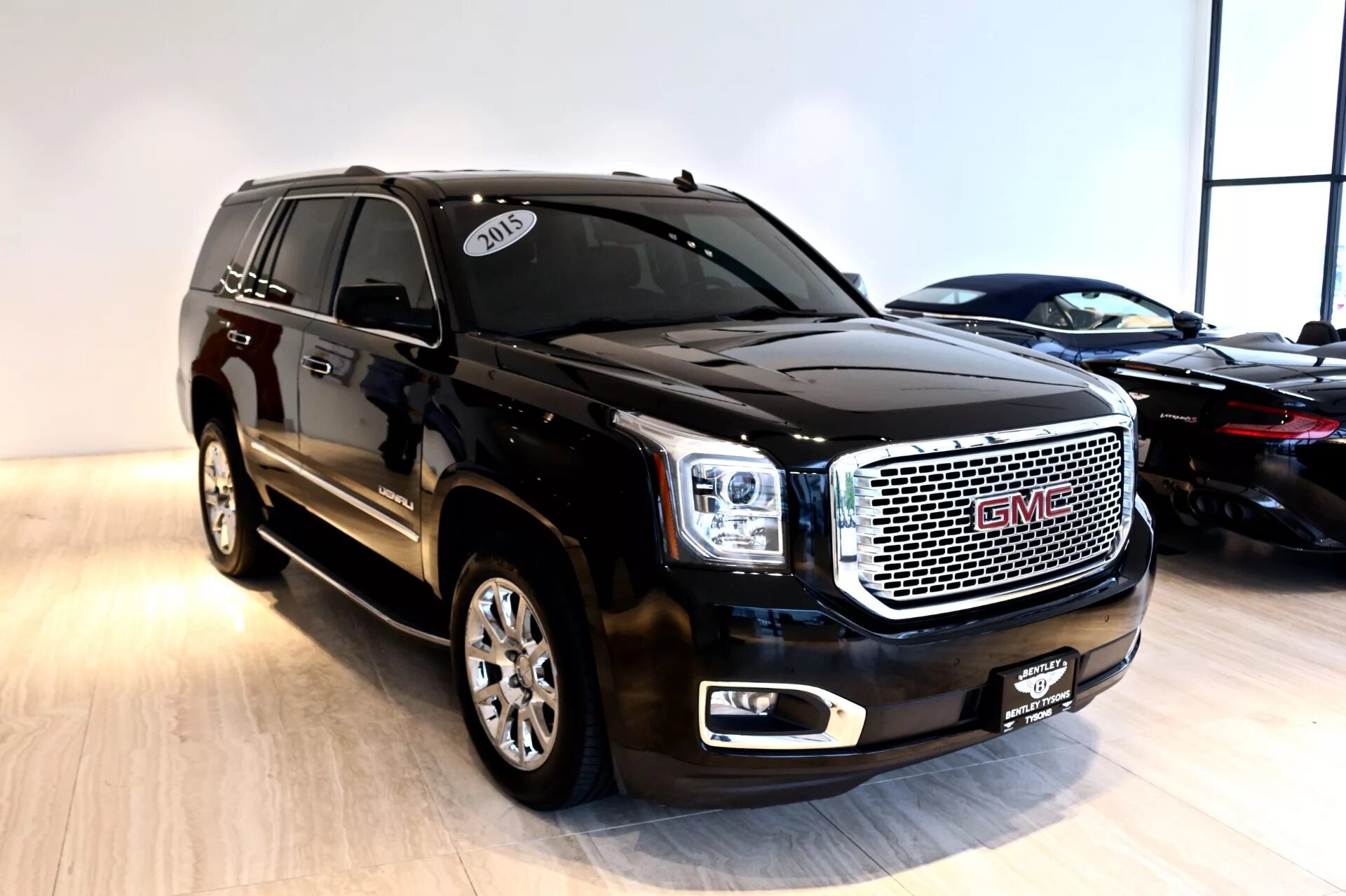 Автомобиль gmc. 2015 GMC Yukon Denali. GMC Yukon 2015. GMC Yukon Denali 2023. GMS машина Юкон.