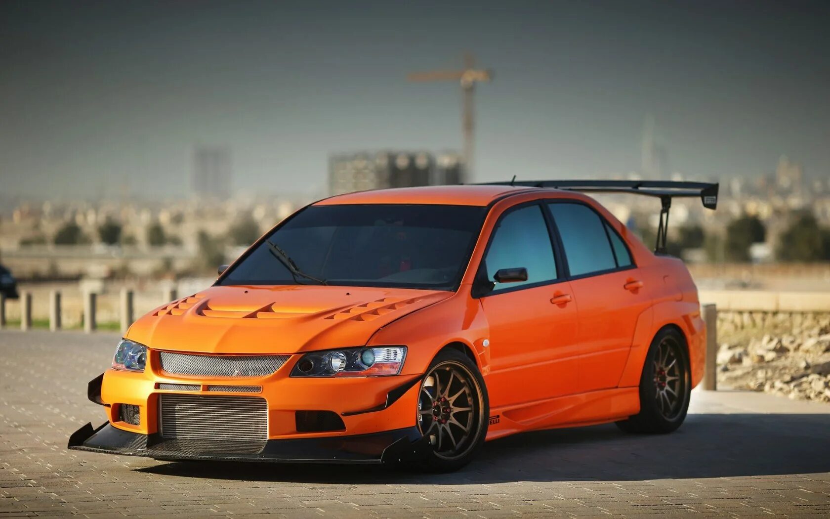 Mitsubishi lancer evolution 11. Mitsubishi lancer evo 9. Mitsubishi lancer evo 8. Митсубиси лансер 10 evo. Митсубиси лансер эволюшн 1.