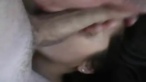 More related wife holding cock to her face.