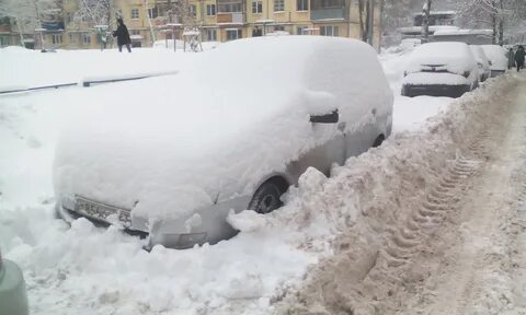 Засыпанные снегом предложение